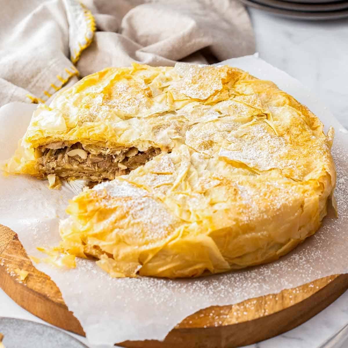 Chicken bastilla dusted with powdered sugar