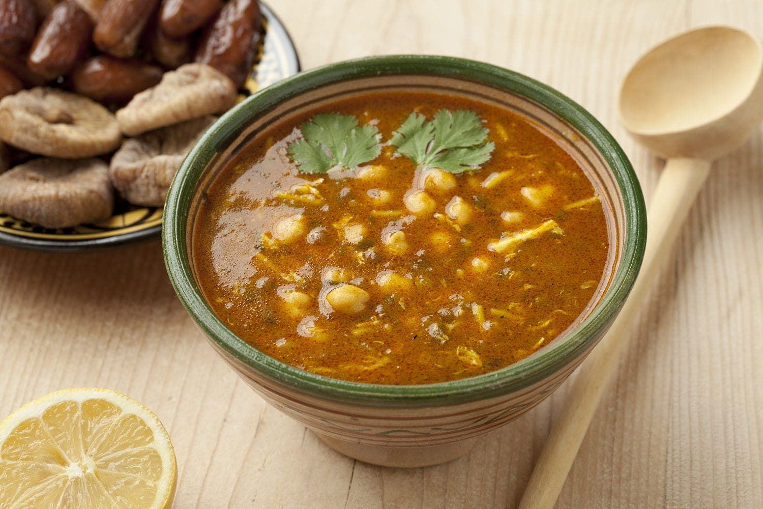 Harira soup with chickpeas, herbs, and lemon